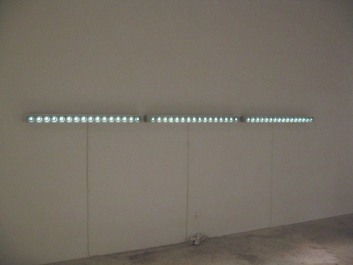 1- 48 Photographs – Aluminum cubes – Plexiglas – wood – LED lights
